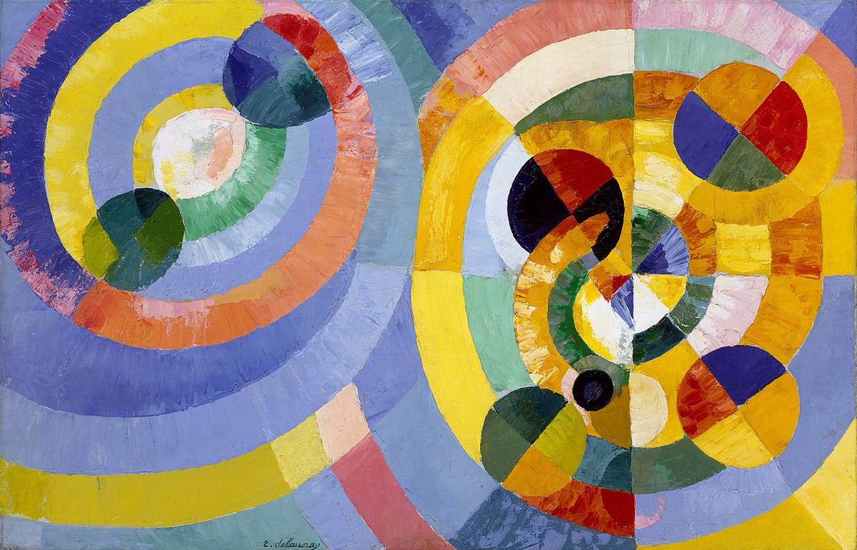 abstract painting showing circles of different sizes orbiting one another