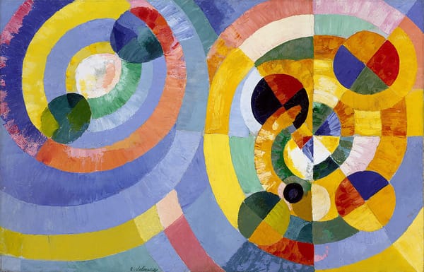 abstract painting showing circles of different sizes orbiting one another